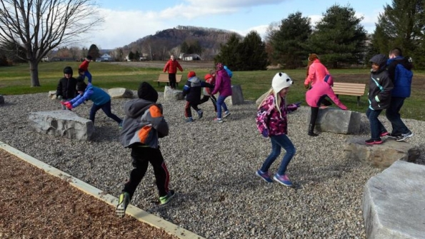 Students play on new playground at Sunderland Elementary School