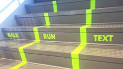 A stairway in the Student Life &amp; Wellness Center at Utah Valley University calls attention to multitasking students who text while walking.