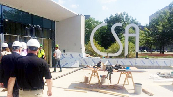 Workers prepare the new Cleveland School of the Arts for its opening on Aug 17
