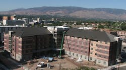 Workers are wrapping up construction of Peavine Hall, a student housing development at University of Nevada Reno.