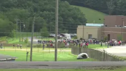 Students flee from Barbour High School in Philippi WVa after an armed student allegedly held a teacher and classmates hostage in a classroom
