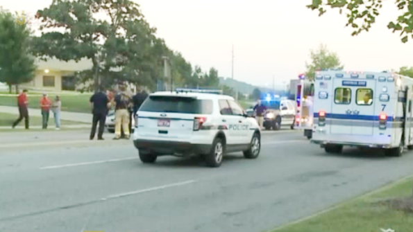 A man with a machete attacked two people in a wooded area on the campus of the University of Arkansas