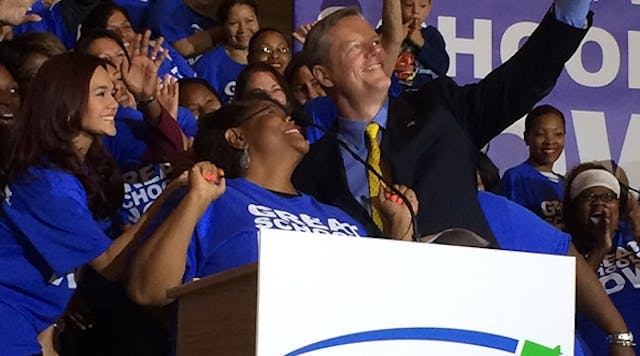 Massachusetts Gov. Charlie Baker attends a rally to push for lifting the state&apos;s restrictions on charter schools.