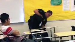 Video shows police officer flipping a student while she sits in her desk in Columbia SC Video shows police officer flipping a student while she sits in her desk in Columbia SC