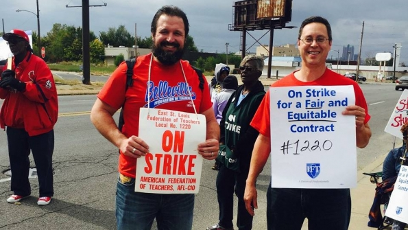 Teachers in East St Louis Ill walked a picket line for a month before the union and school district reached a contract agreement