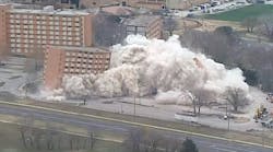 The University of Kansas uses explosives to implode McCollum Hall, which thousands of students called home over its 50-year life.
