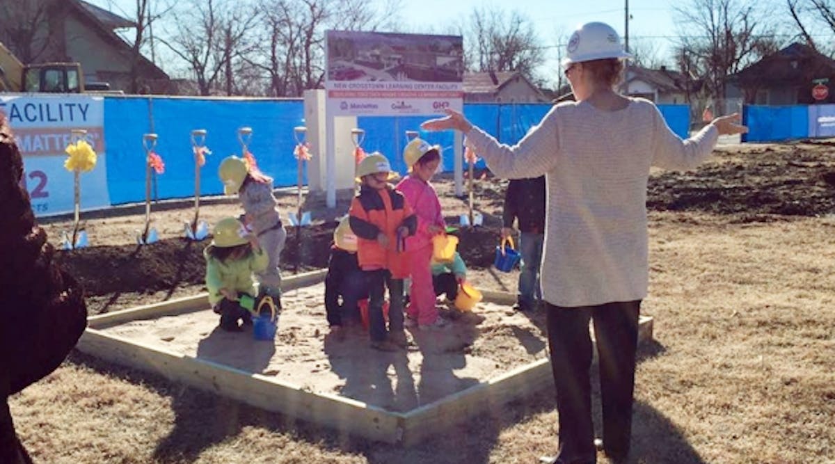 Students at Crosstown Learning Center in Tulsa take part in the groundbreaking for a new facility.