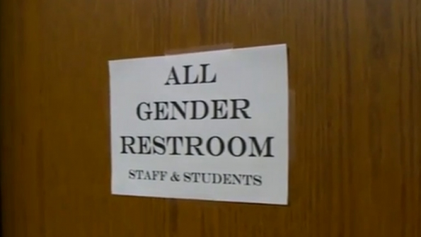 A sign on the door of a newly designated genderneutral bathroom at Roosevelt High School