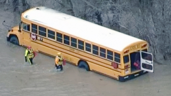 Students in Denton Texas were brought to safety after their school bus became stuck in floodwaters