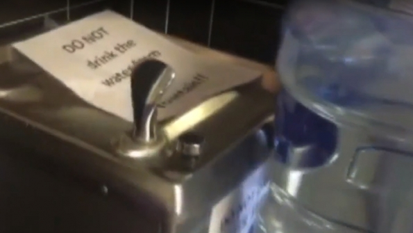 Sign on a fountain in a Newark NJ school warns students not to drink the water