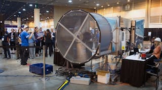 Competing teams test their turbines in a wind tunnel.