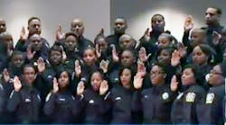 New police officers with the Atlanta school district are sworn in.