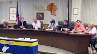 Under threat of state takeover, the Boone Couny (W.Va.) board approved a budget.