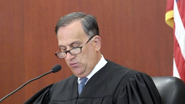 Judge Thomas Moukawsher announces his ruling that the school funding formula in Connecticut is unconstitutional