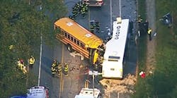 A school bus driver was killed, as were five people on a commuter bus, when the two vehicles crashed in Baltimore.