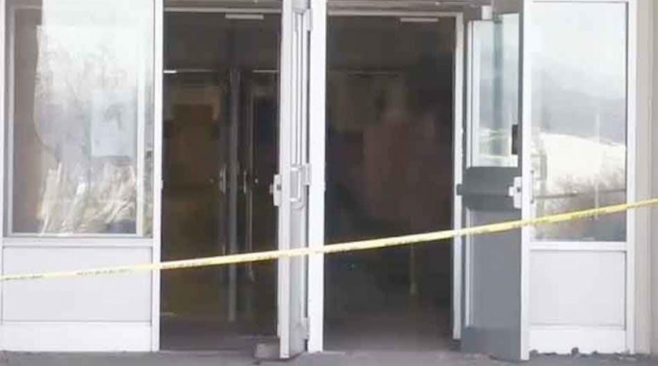 Doors were propped open at Helena High School to air out the smoke-damaged interior.