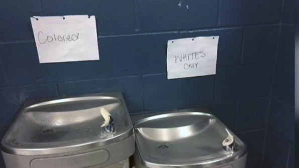 Someone placed racist signs above water fountains at First Coast High School in Jacksonville