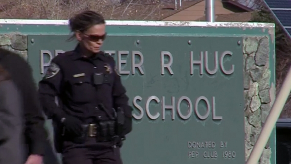 Police patrol outside Hug High School in Reno Nev after a student was shot