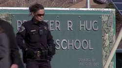 Police patrol outside Hug High School in Reno, Nev., after a student was shot.