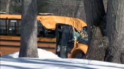 The driver of this school bus died after a tree fell onto the vehicle.