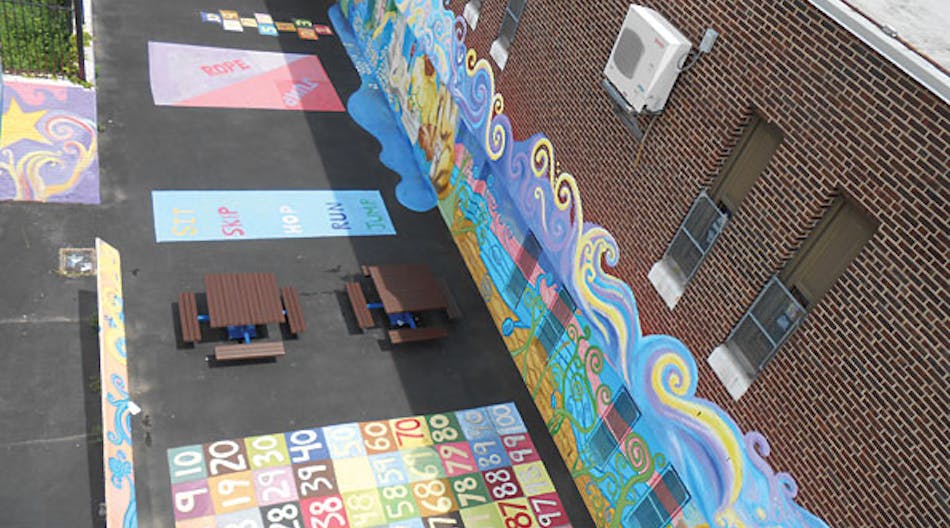 A once-bare concrete lot at Bayard Taylor Elementary School, Philadelphia, has been transformed into a modern play area.