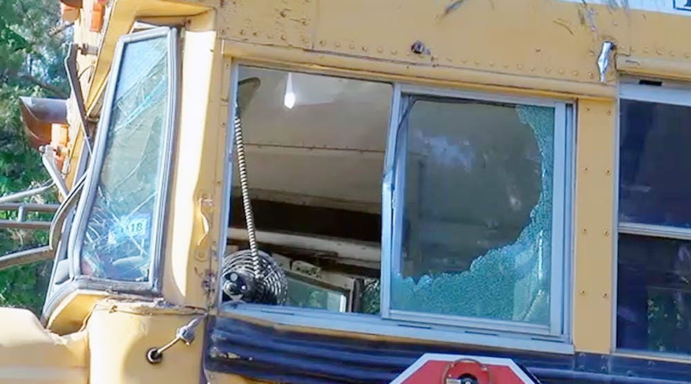 A 11-year-old student was killed when this Shelbyville (Texas) school district bus was struck from behind by a pickup truck.