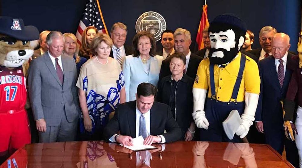 Arizona Gov. Doug Ducey signs legislation that will provide state universities funding for building upgrades.