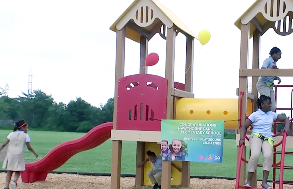 Children from Hawthorne Park Elementary School check out their new playground