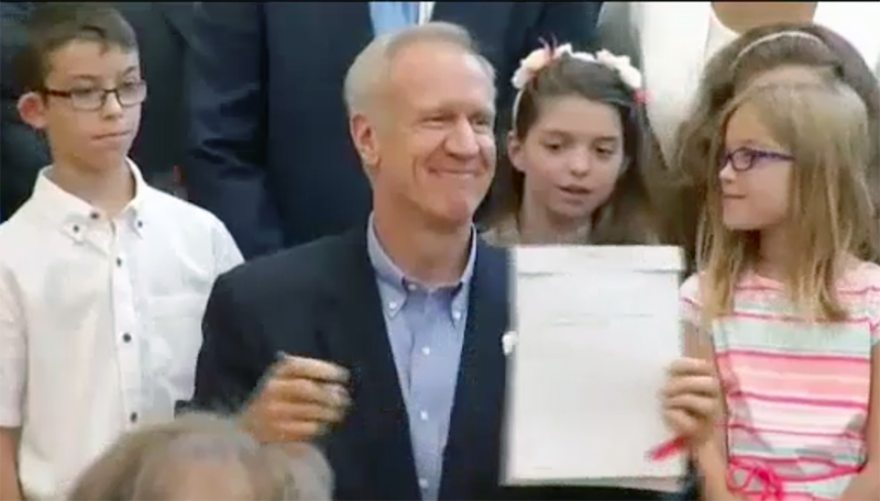rauner signs school bill