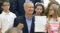 rauner signs school bill
