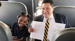 Houston Supt. Richard Carranza rides a bus with students on the first day of classes.