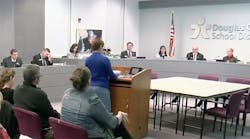The Douglas County (Colo.) school board hears public comments before voting to end a voucher program.