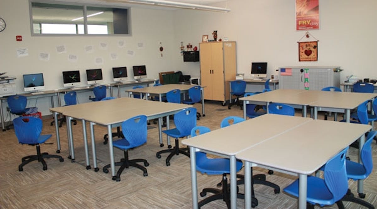 Classrooms in the Blue Valley Center for Advanced Professional Studies (CAPS), Overland Park, Kan., have rolling furniture that can be reconfigured as classroom needs change. Photo by Jennifer Ray