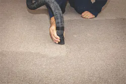 Vacuuming moisture from wet carpet Vacuuming moisture from wet carpet