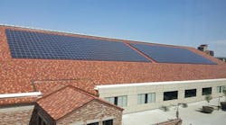 An 850-kilowatt solar array sits atop the Indoor Practice Facility at the University of Colorado Boulder
