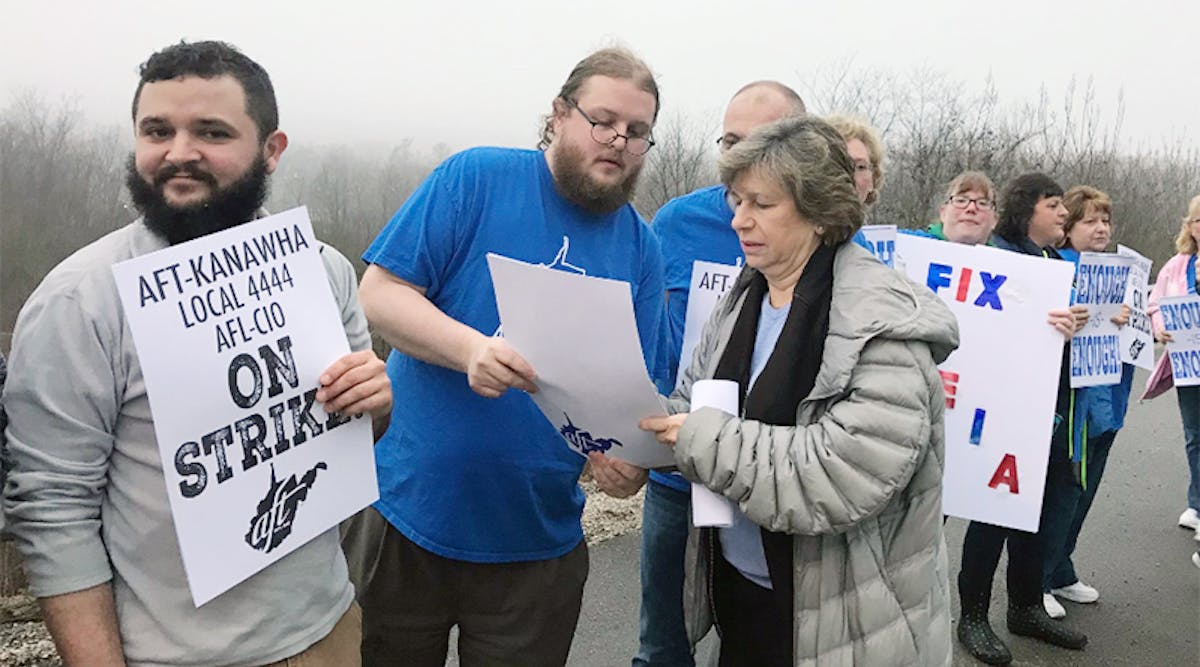 Teachers in West Virginia picket for better pay and benefits