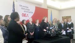 The Oklahoma Education Association spells out its salary demands at a Thursday news conference.