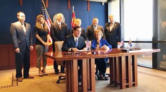 Arizona Gov. Doug Ducey signs a sales tax extension for education.