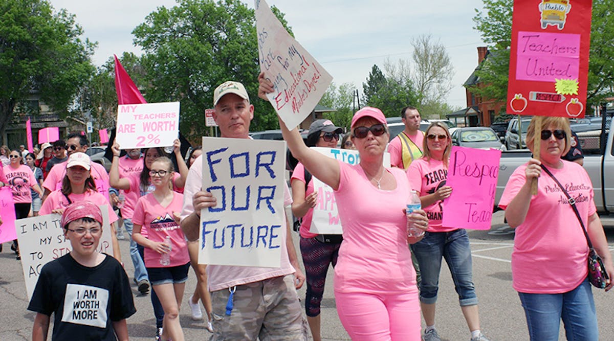 Teachers in Pueblo, Colo., walk a picket line in push for better pay.