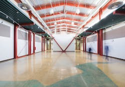 Ample daylight fills this maker space, which was created by adjoining to a previously built science education facility. Tall ceilings with accompanying clerestory glass and light shelves work in concert with carefully designed, installed, and maintained daylight sensors that automatically dim electrical lighting to minimize energy use. Ample daylight fills this maker space, which was created by adjoining to a previously built science education facility. Tall ceilings with accompanying clerestory glass and light shelves work in concert with carefully designed, installed, and maintained daylight sensors that automatically dim electrical lighting to minimize energy use.