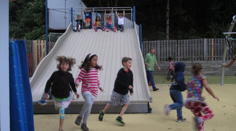 A 10-foot-wide slide is one of many signature features of the playground at Fayerweather Street School in Cambridge, Mass.