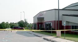 Police cordon off the crime scene at Luther High School.