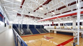 The gymnasium at Talawanda High School includes a 360-degree band of windows to maximize daylight. Architect: SHP Leading Design.