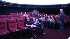 Marc Horowitz, planetarium director and head of the Edward R. Murrow High School astronomy program, speaks to students about the renovations made to the school&apos;s planetarium.