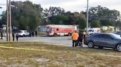 Emergency personnel respond to Tampa school bus stop where students were struck by a car.