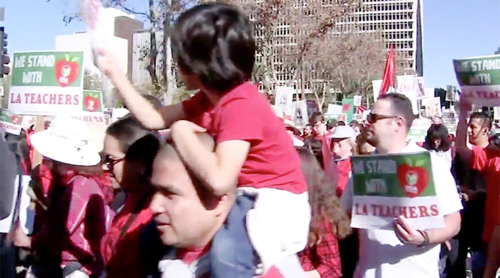 Teachers in Los Angeles rally in support of a new contract with the school district.