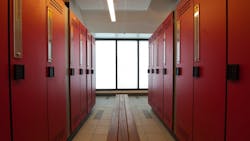 Translucent glass in the menrsquos and womenrsquos team locker rooms provides daylighting within and symmetry when viewed from the pool deck Translucent glass in the menrsquos and womenrsquos team locker rooms provides daylighting within and symmetry when viewed from the pool deck
