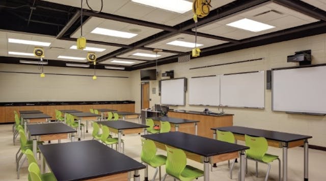 In the renovated science lab at Beaver Dam High School in Beaver Dam, Wis., each workstation is equipped with multiple power outlets, and select labs feature power outlets suspended from the ceiling, which can be lowered as necessary.