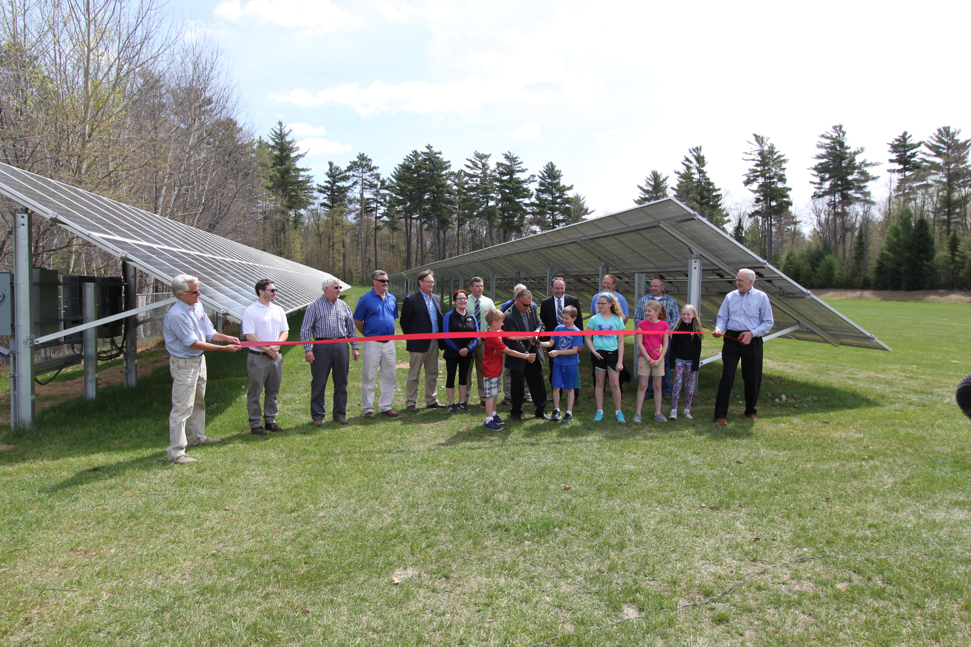 Ribbon cutting for a new solar photovoltaic system