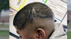 The family of Juelz Trice has sued school officials after they used a marker to color in his haircut.